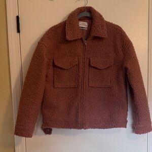 Pink Teddy coat from Urban Outfitters